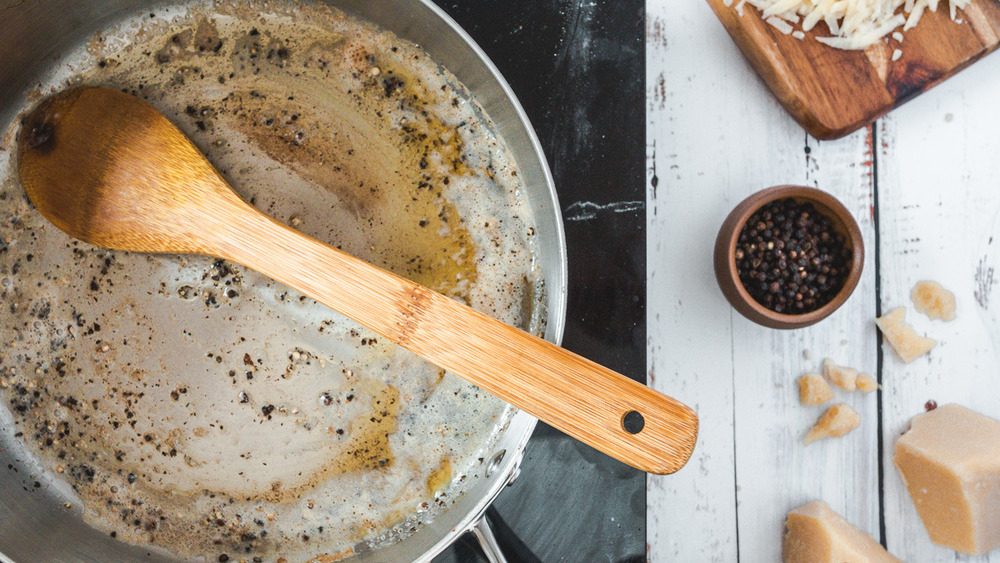 butter and black pepper in pan