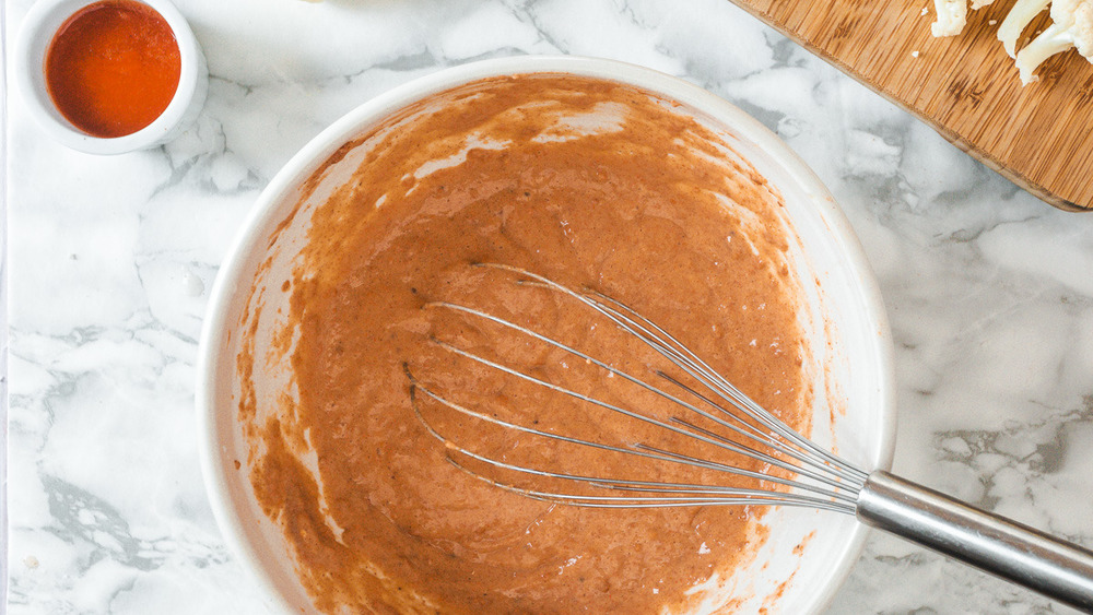 buffalo cauliflower batter and whisk