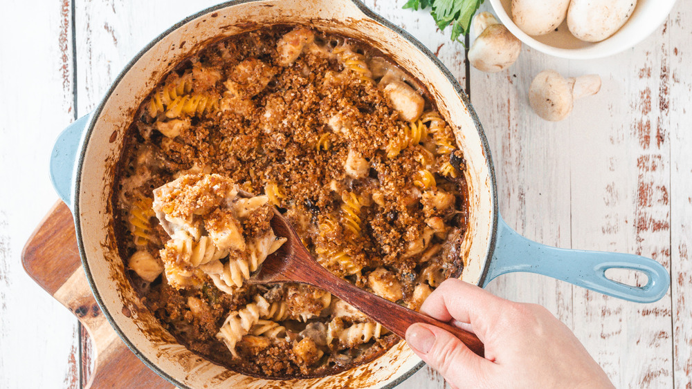 serving chicken casserole from the pan