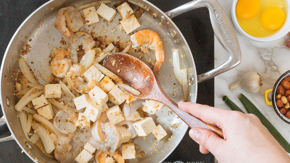 shrimp and tofu in a pan