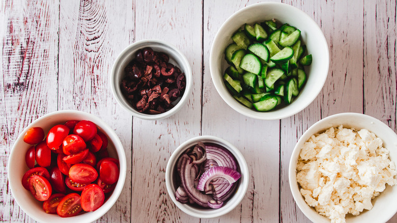 salad ingredients in bowls