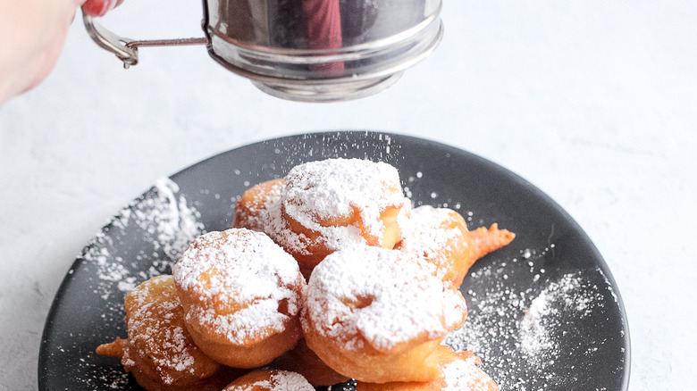 powdered sugar on cake bites