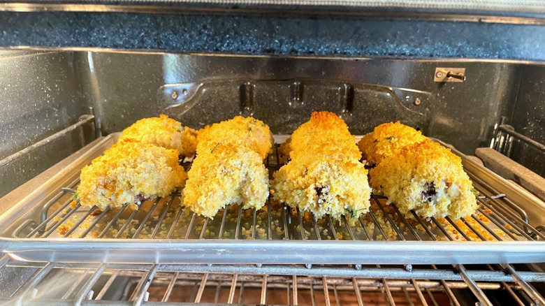 breaded chicken baking in the oven