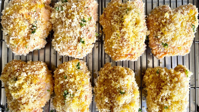 breaded chicken on baking rack