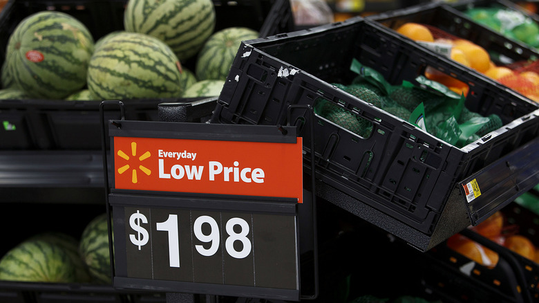 Walmart price sign near watermelons