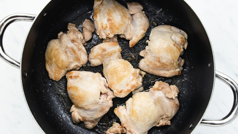chicken thighs in pan 