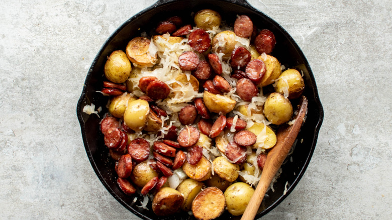 kielbasa and potatoes in skillet 