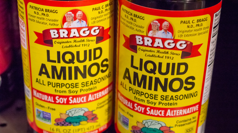 Two bottles of Bragg liquid aminos