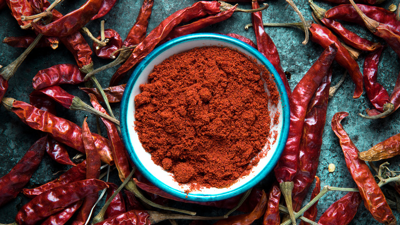 Dried whole and ground cayenne peppers