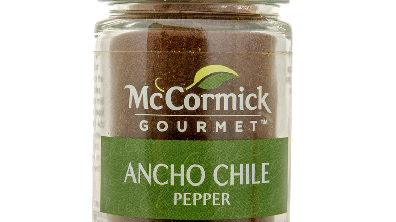 Ancho powder in glass spice bottle