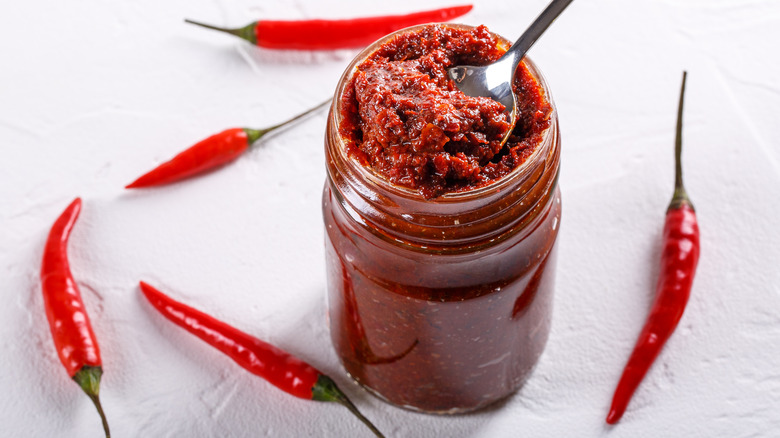 Glass jar of red pepper paste