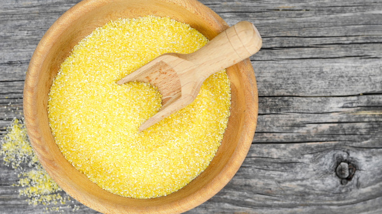 Wooden bowl of cornmeal