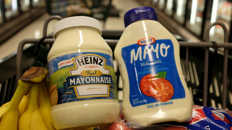 Two containers of mayonnaise in a shopping cart