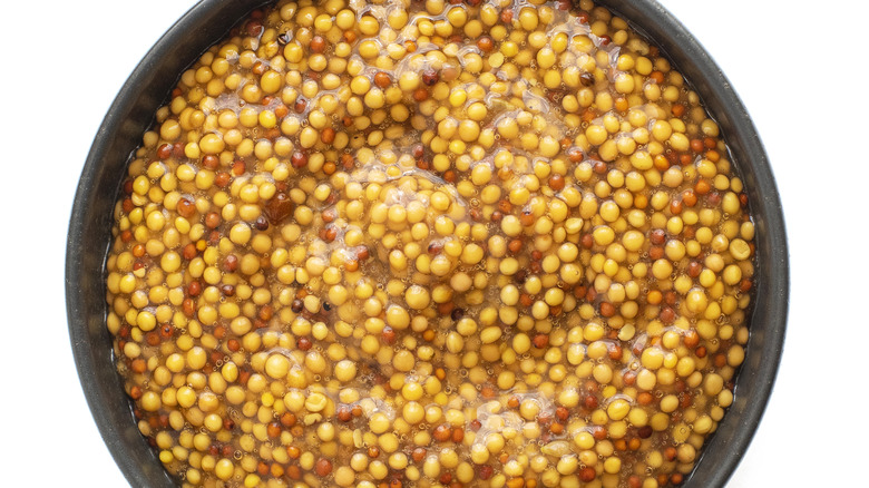 A bowl of spicy brown mustard