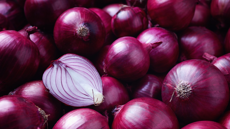 A pile of red onions