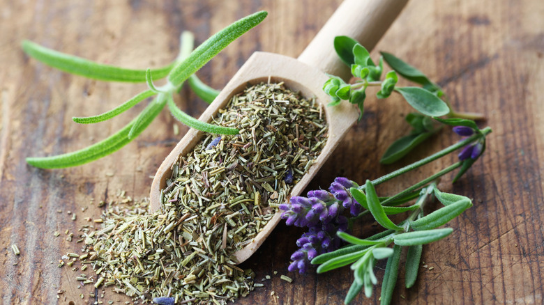 Herbes de Provence with lavender in wooden scoop