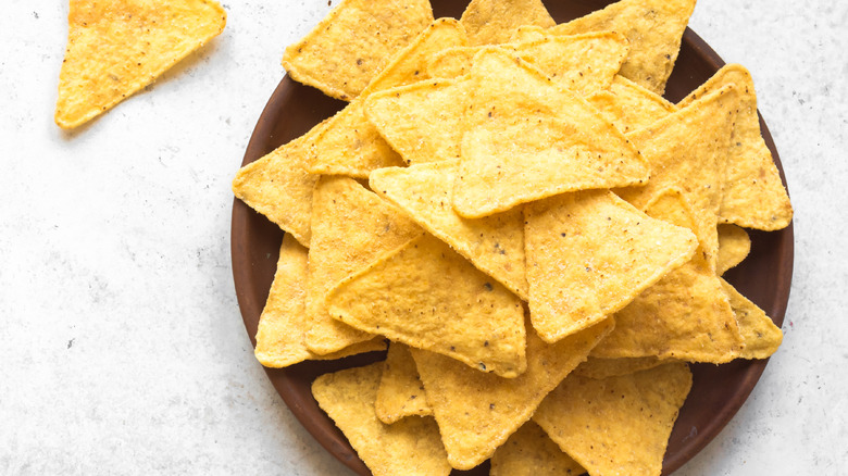 tortilla chips in brown bowl