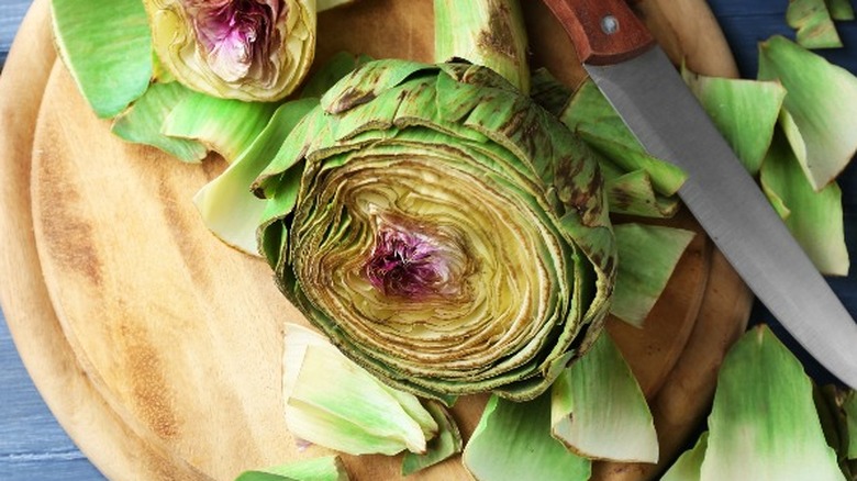 Artichokes on cutting board