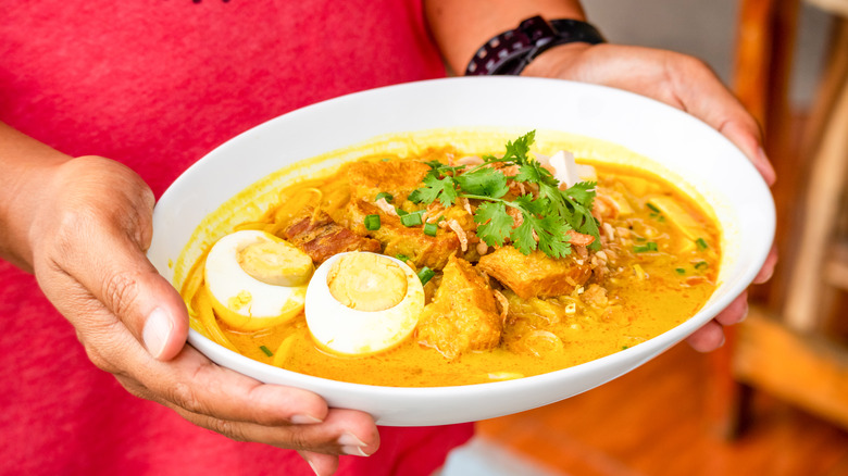 Laksa curry in a white dish