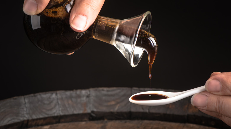 Balsamic vinegar poured into a spoon