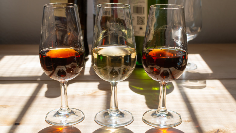 Glasses of sherry on table