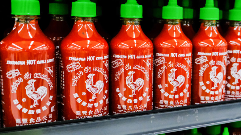 Bottles of sriracha hot sauce