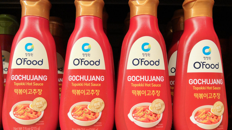 Red bottles of gochujang sauce