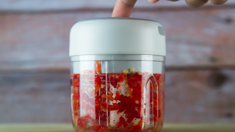 ground chili peppers in small blender