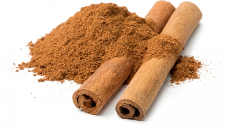 Ground cinnamon and whole cassia sticks