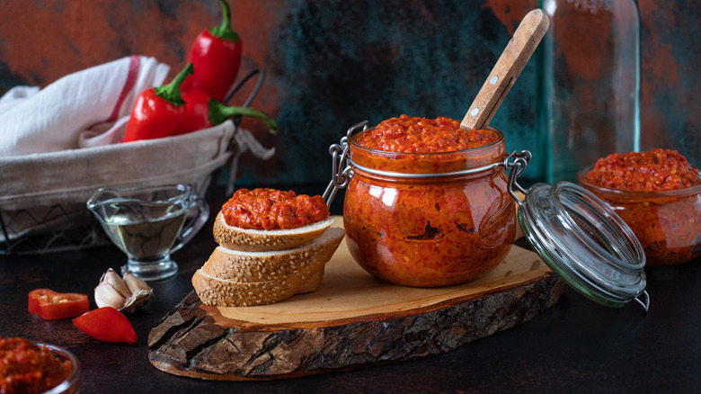 Ajvar in a jar and on a slice of bread 