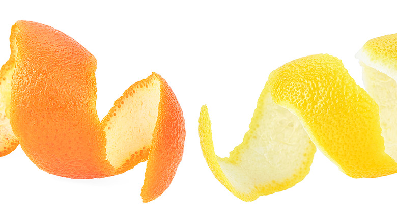 Two citrus zests, one yellow one orange