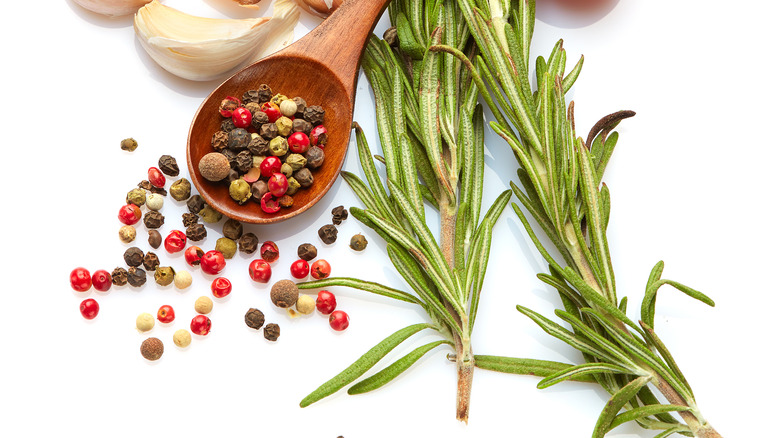 Mixed peppercorns, garlic cloves, fresh herbs