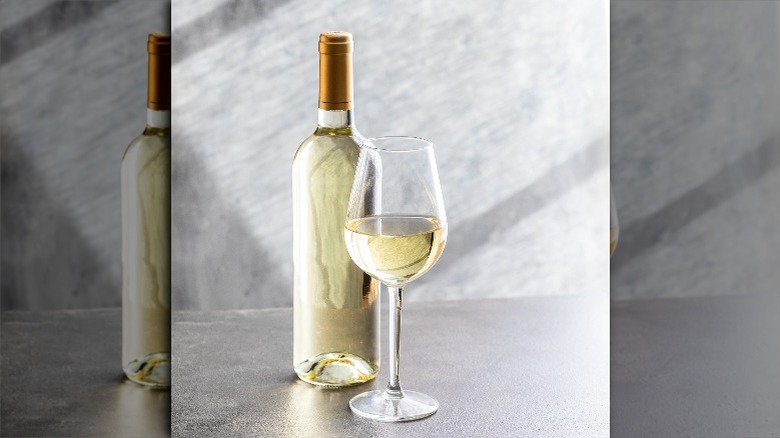 bottle and glass of white wine