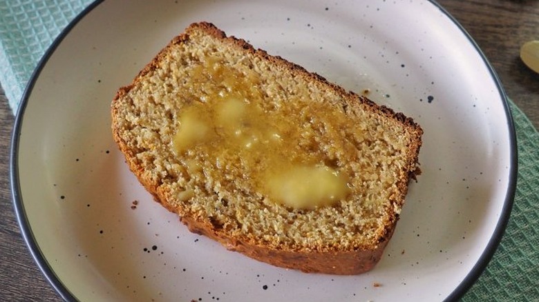 Buttered bread on a plate