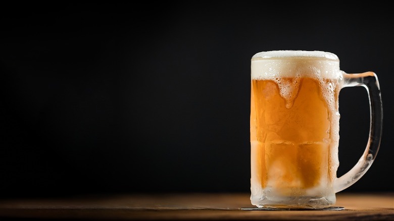 frothy beer in a mug