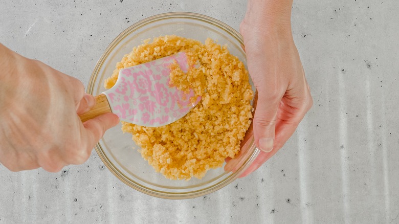 Crushing crackers in bowl