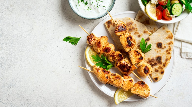 souvlaki with salad and tzatziki