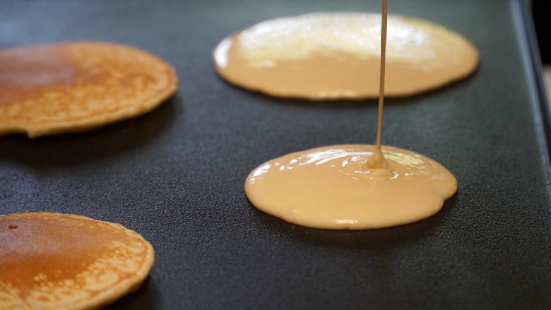 pouring pancakes batter