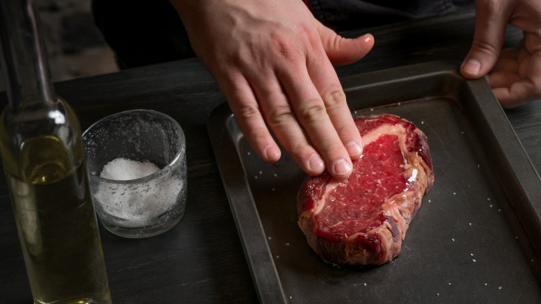 touching steak