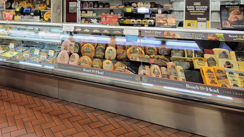 Boar's Head meat in a glass case at a deli