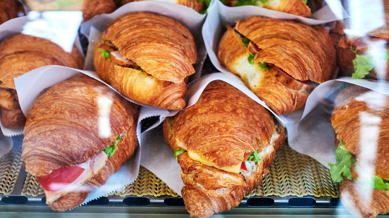 Premade sandwiches behind a glass counter