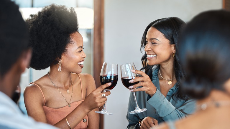 women drinking wine