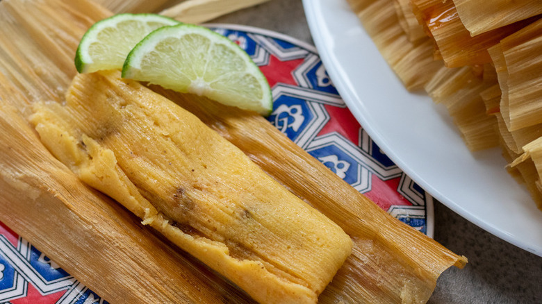 open tamale with lime slices