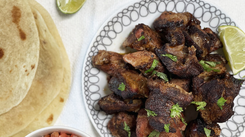 pork chunks on patterned plate