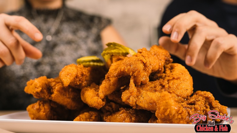 Plate piled with fried chicken