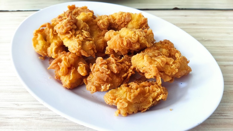 chicken tenders on white plate