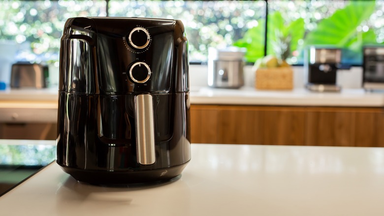 black air fryer on counter