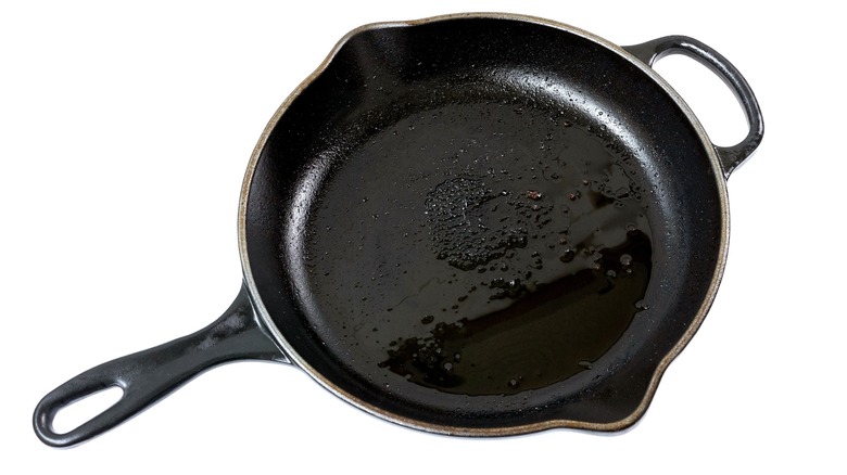 cast iron skillet with fat