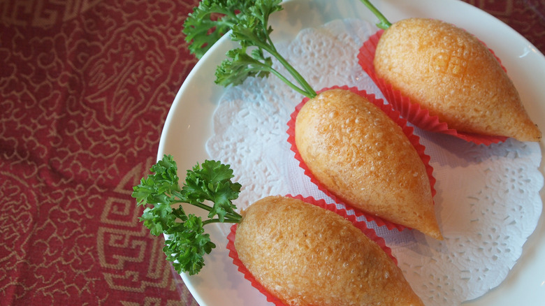 dumplings on plate with parsley