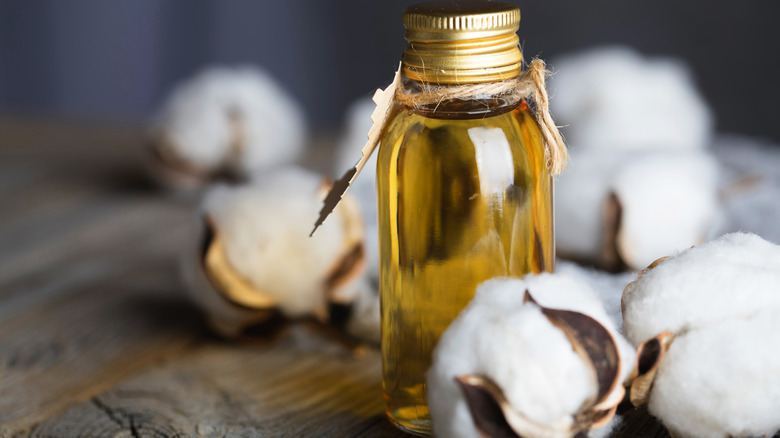 cottonseed oil with cotton flowers